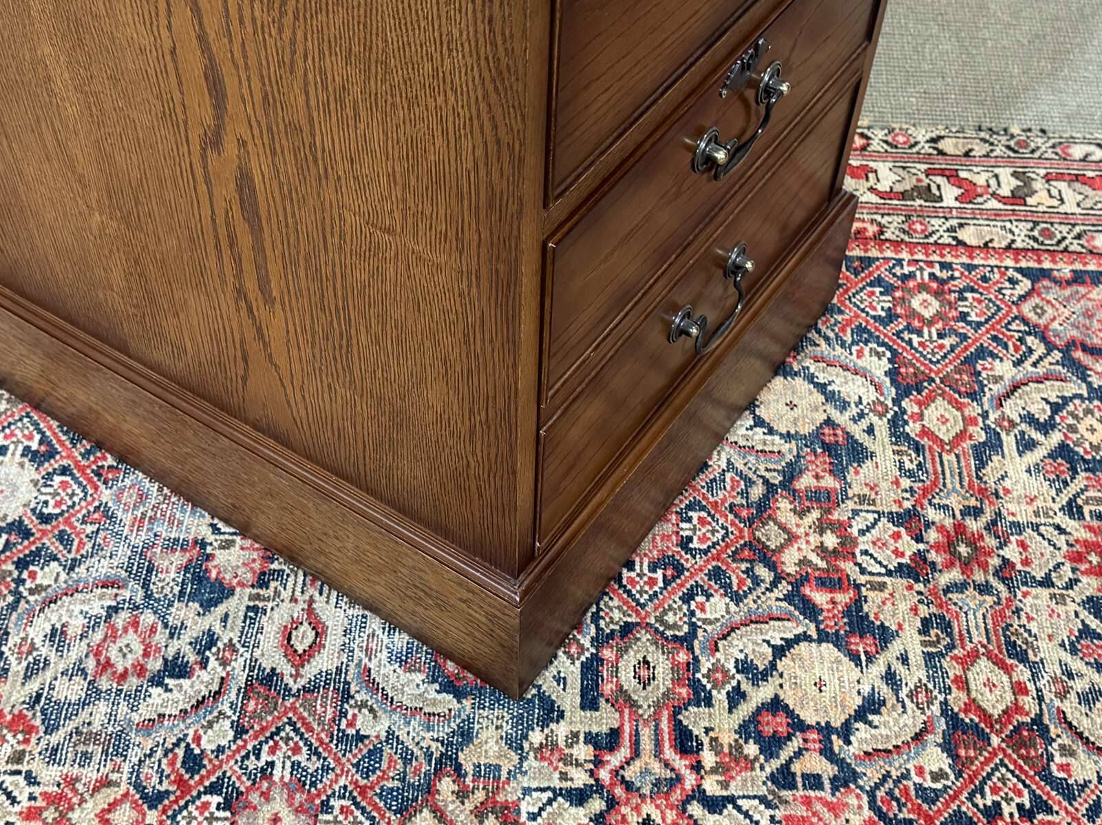 Office cabinet in oak with English leather top from the 1990s.