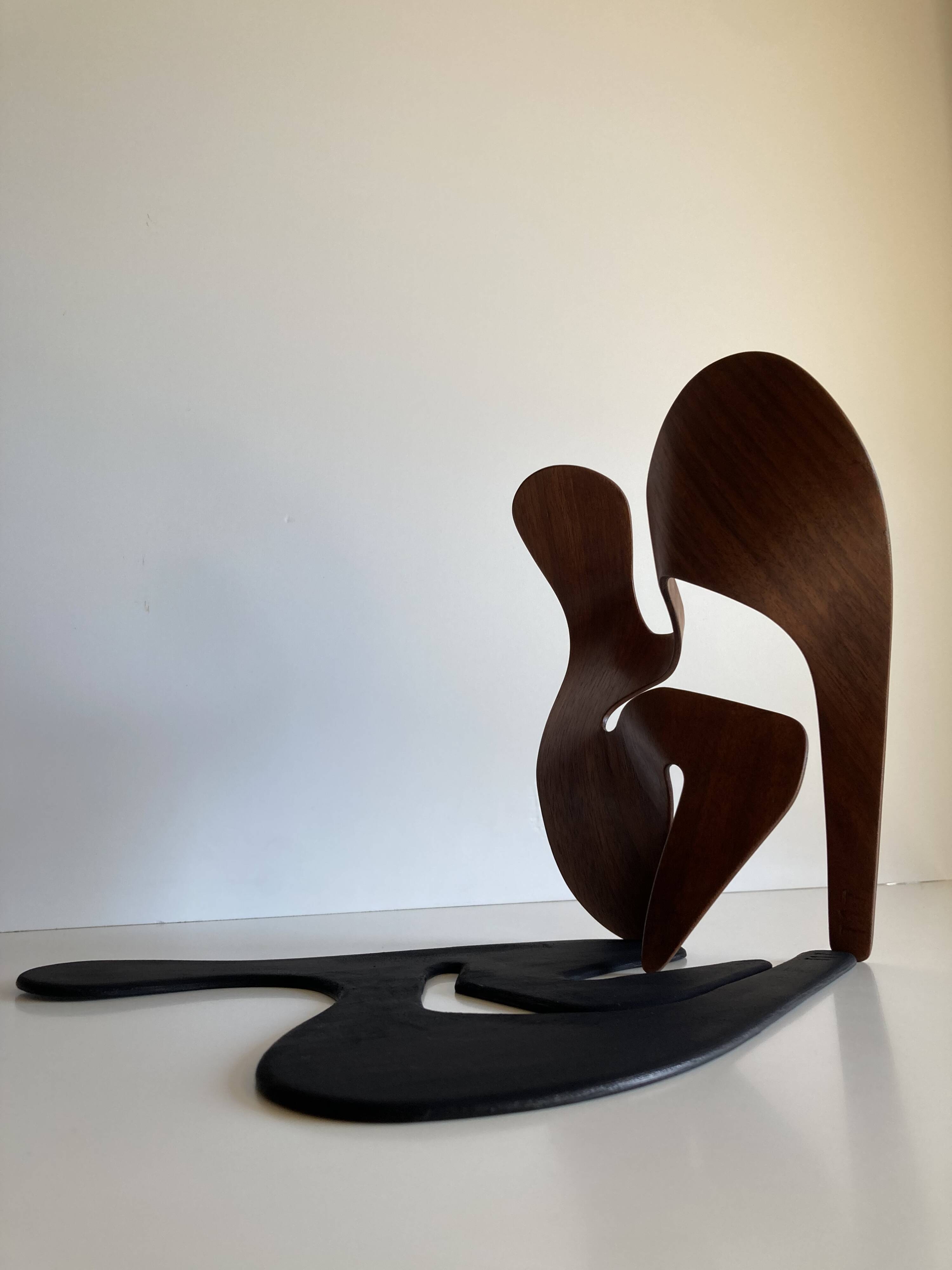 Mrs. Charles Eames_ The shadow does not bend, walnut plywood sculpture