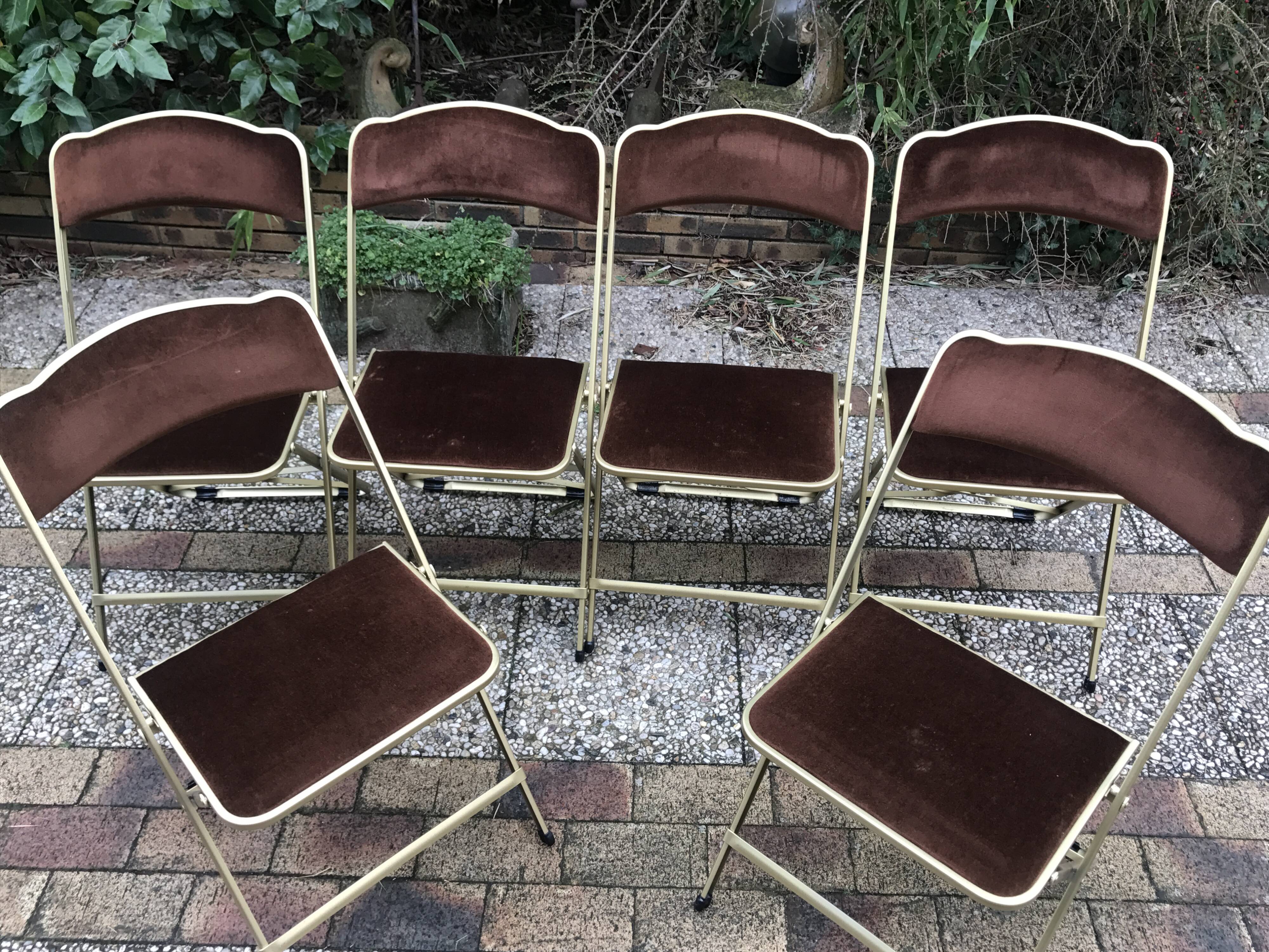 Six vintage folding chairs