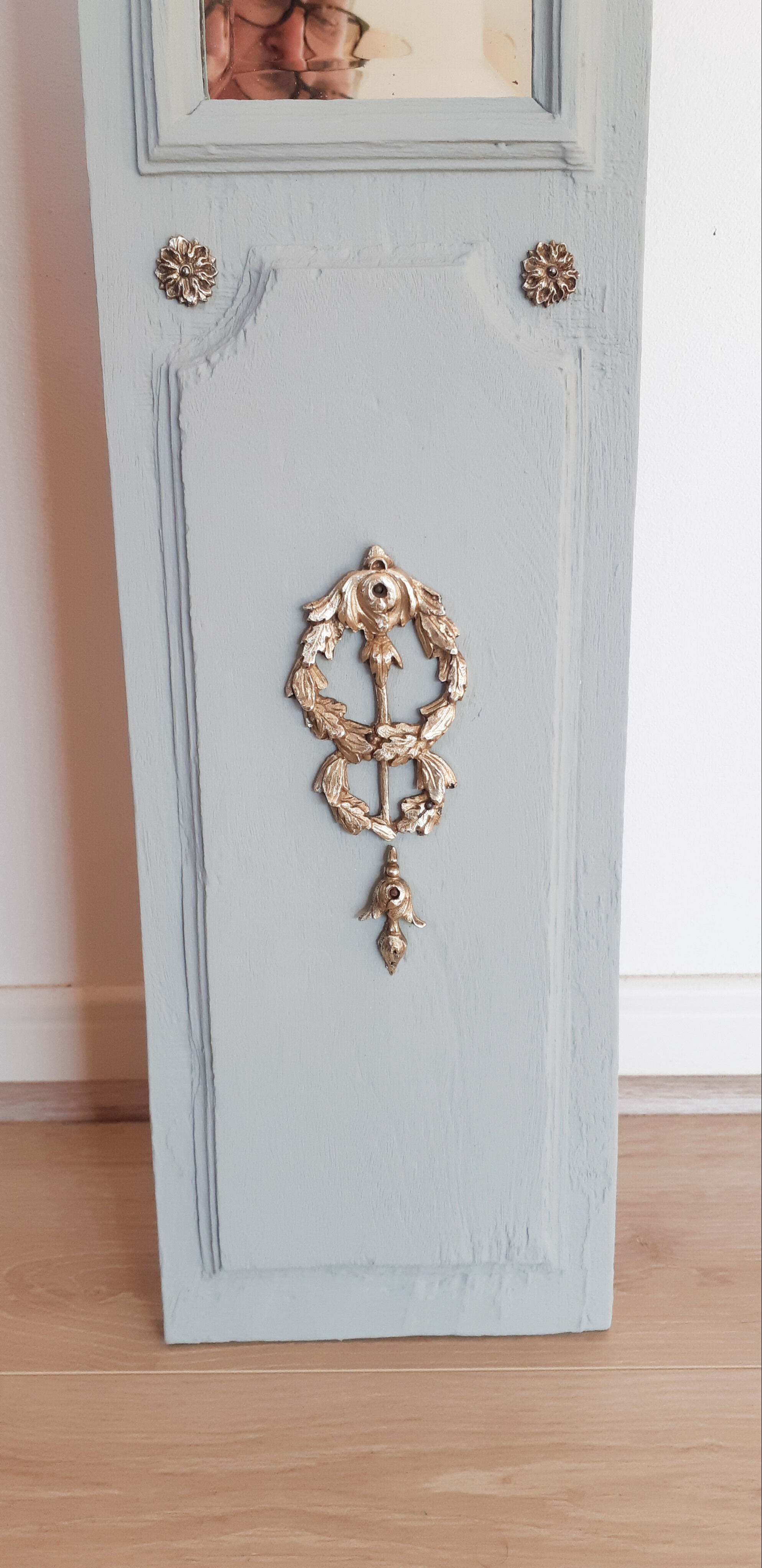 Old mirror patinated green of gray