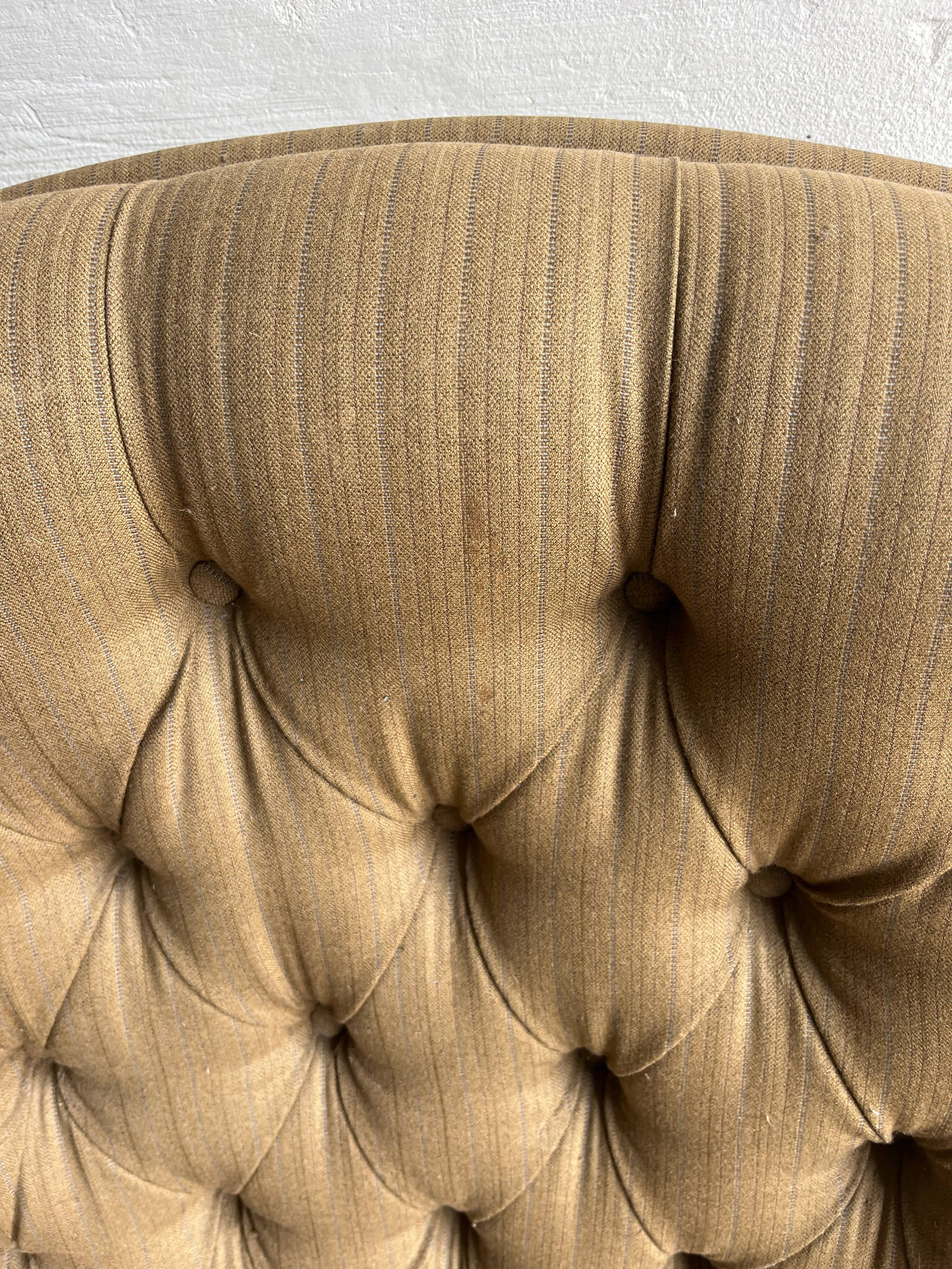Pair of upholstered lounge chairs with ottoman, 1970s