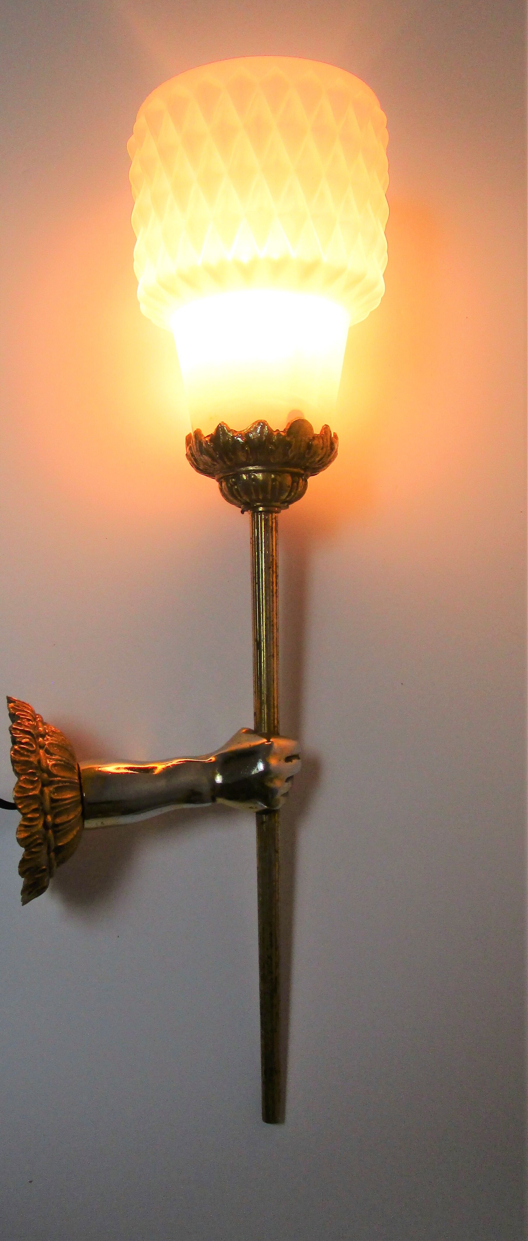 Pair of vintage patinated golden metal hand sconces