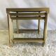 Brass and glass pull out tables 70