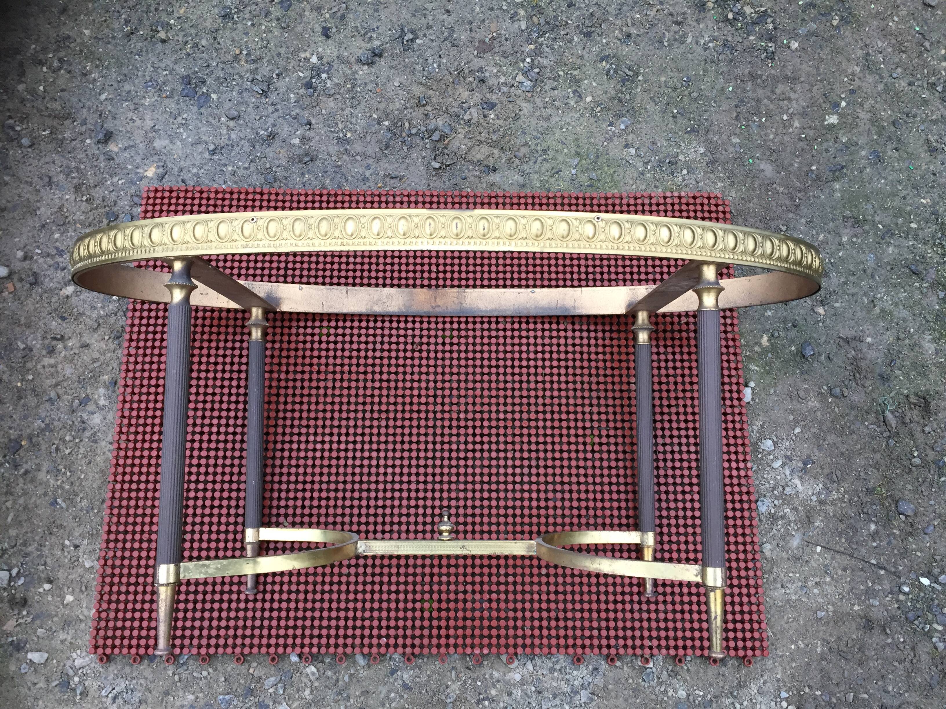 Vintage brass coffee table and oval alabaster top.