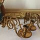 Pair of antique wall-mounted brass candle holders