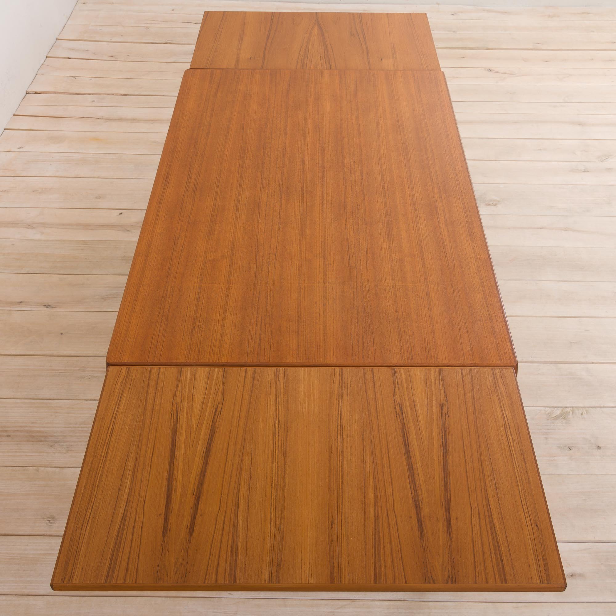 Danish extension dining table in teak by Henning Kjaernulf for Vejle Mobelfabrik, 1960s