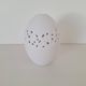 White porcelain egg vase
