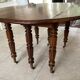 Table ronde ancienne en noyer
