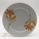 6 “Chriss G. Collection” porcelain dessert plates.