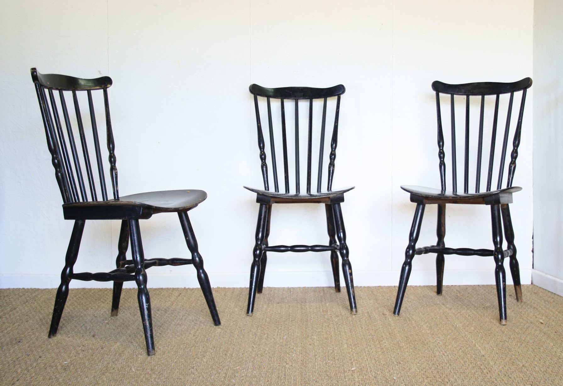 Three black Baumann bistro chairs