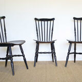 Three black Baumann bistro chairs