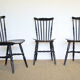 Three black Baumann bistro chairs