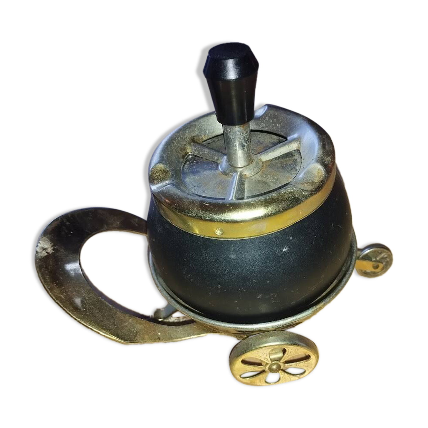Original vintage ashtray on a small wheeled stand.