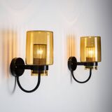 Pair of black metal wall lamps with yellow shades and inner diffuser