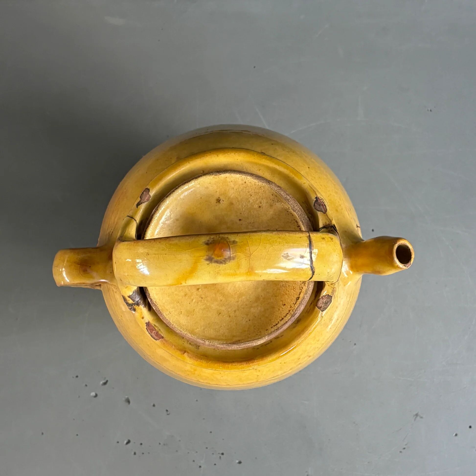 Ancient oil jar in glazed terracotta