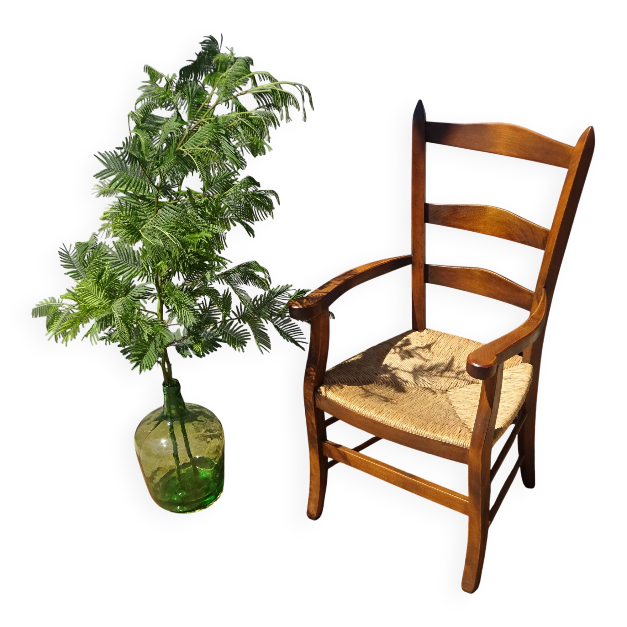 Grandfather's armchair in wood and straw.