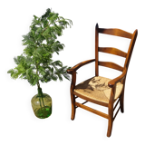 Grandfather's armchair in wood and straw.