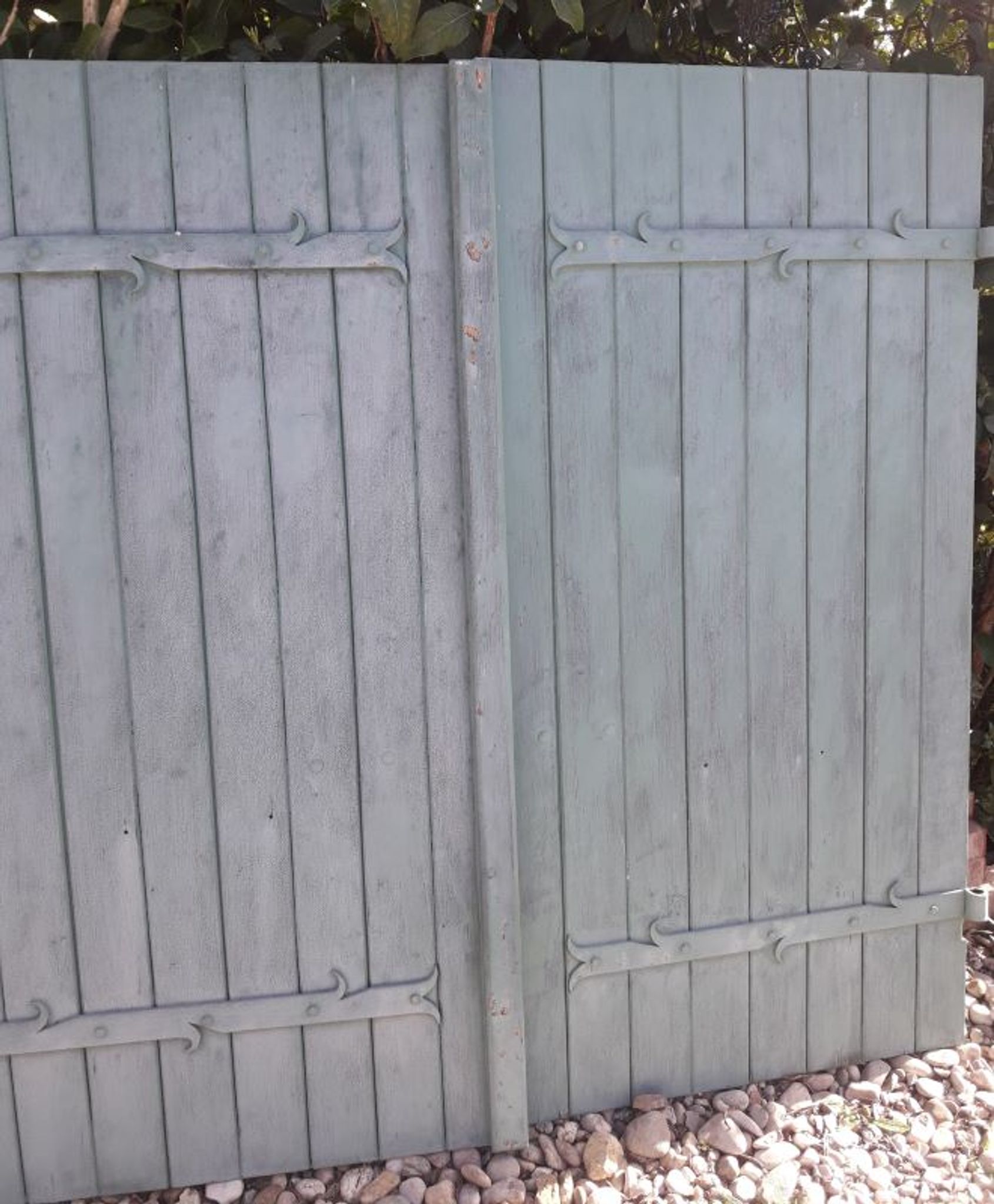 Pair of wooden iron hanging shutters