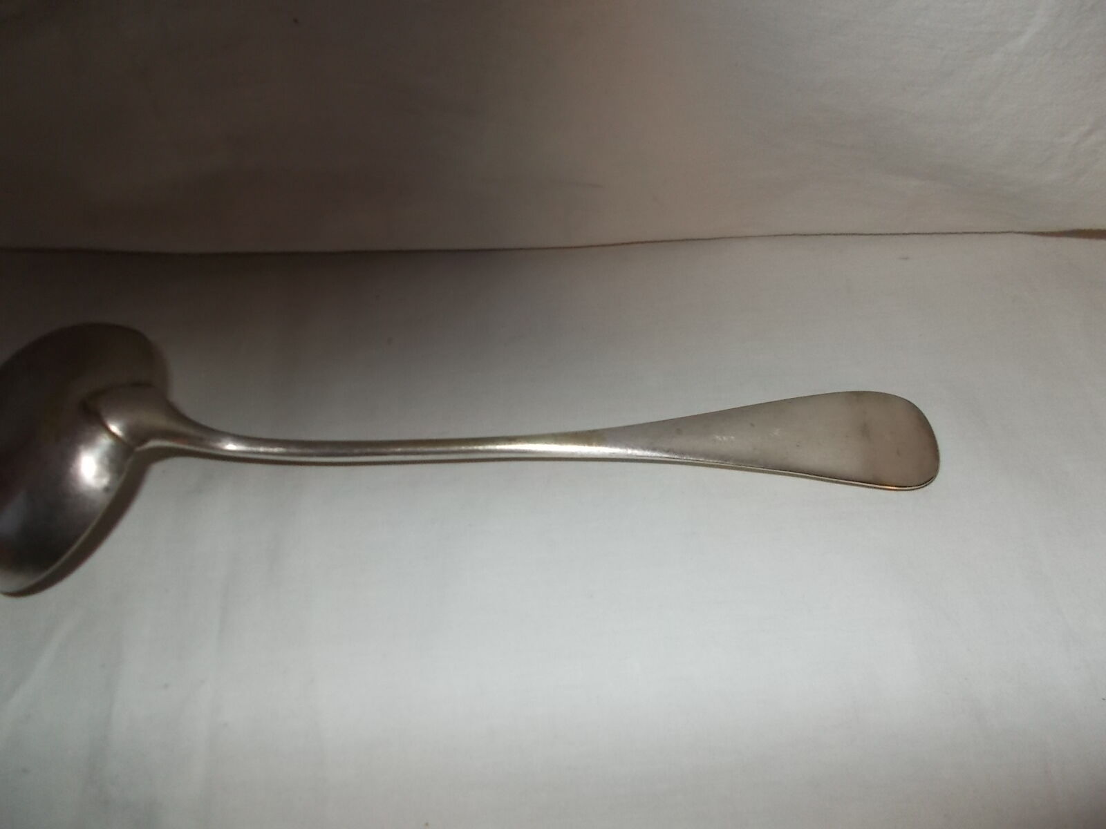 Silver metal ladle