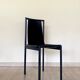 4 postmodern design chairs in black metal and leather, 1980's