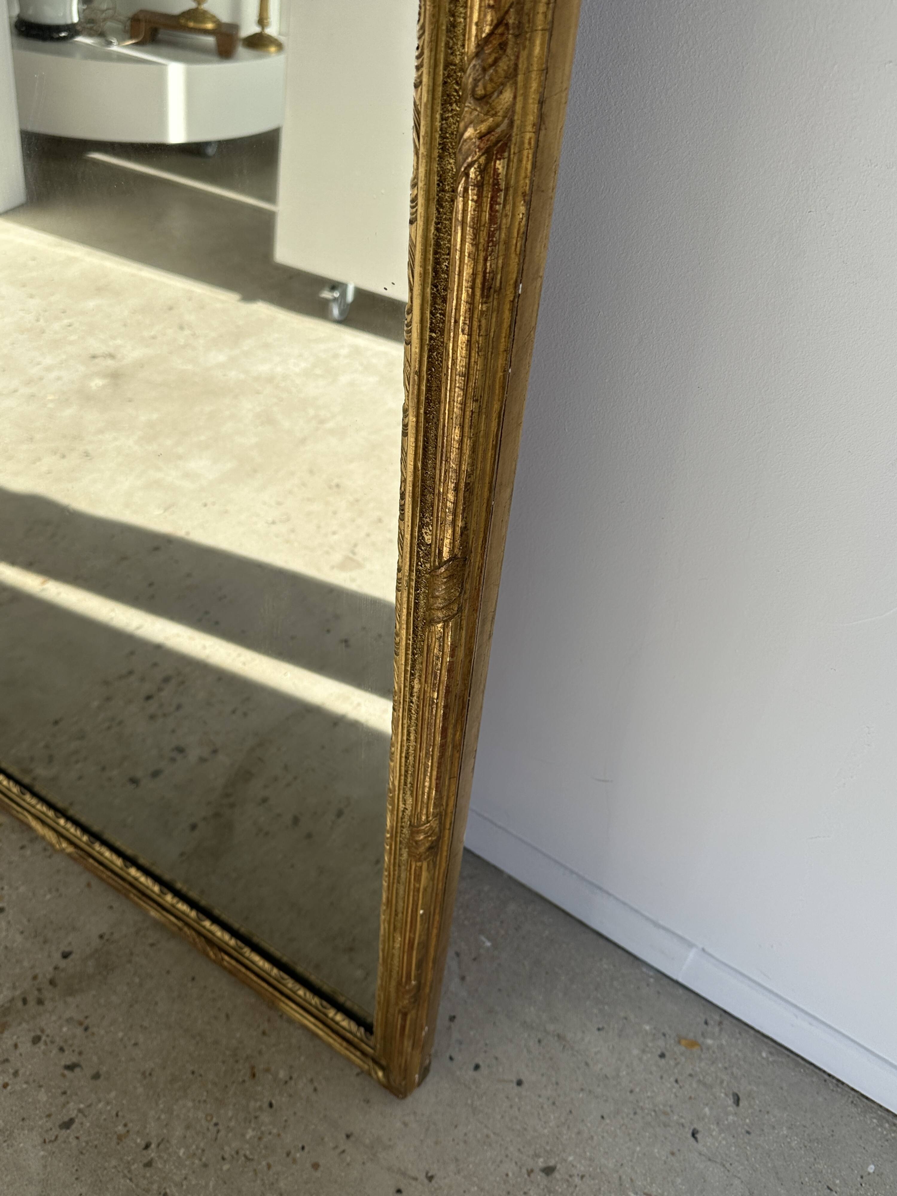 Large gilded mirror 19th century rounded corners mercury glass Louis XVI style