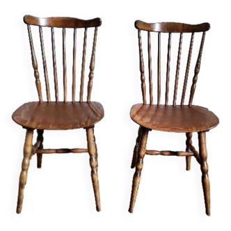 Two vintage bistro chairs signed Baumann