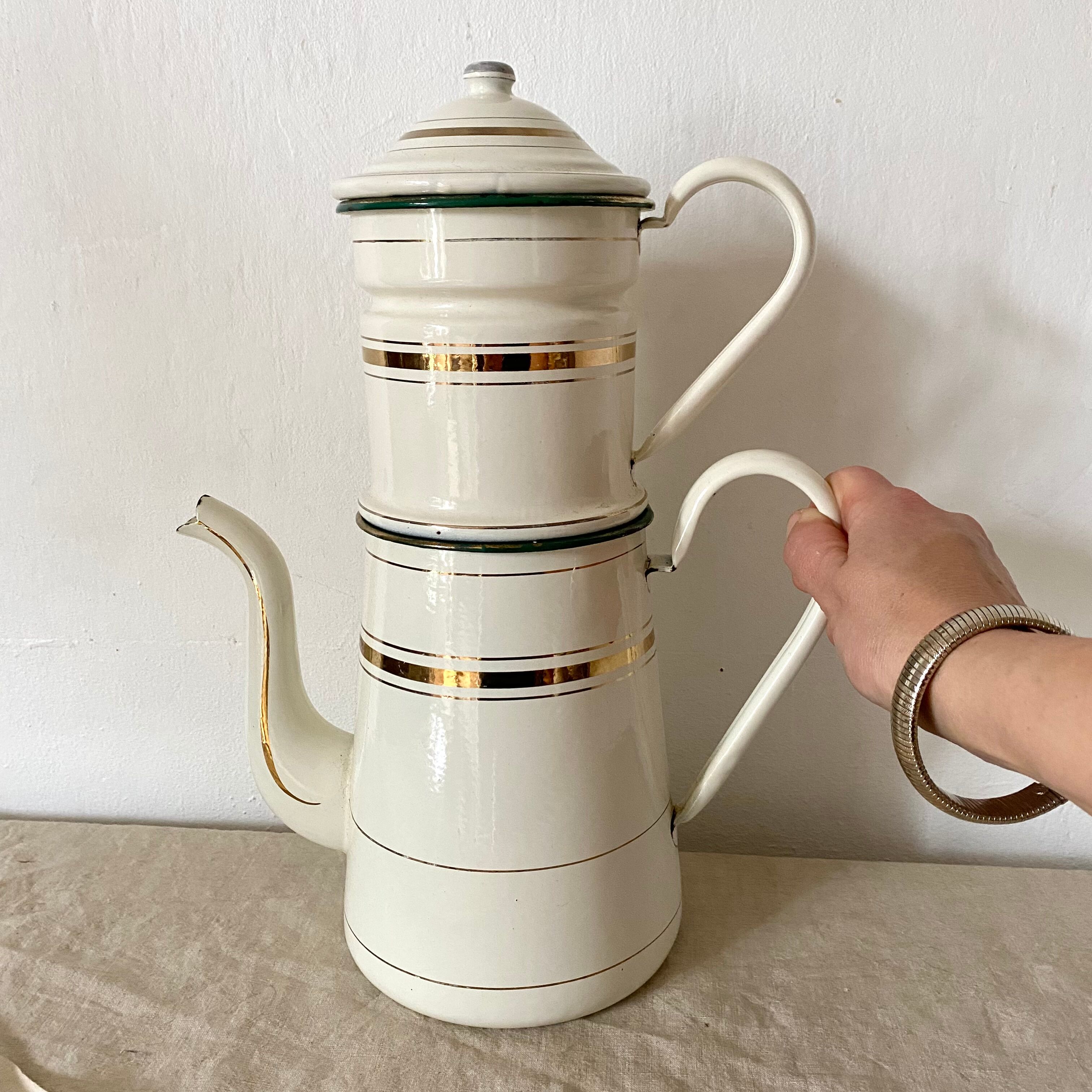 Antique coffee maker in enamelled sheet metal