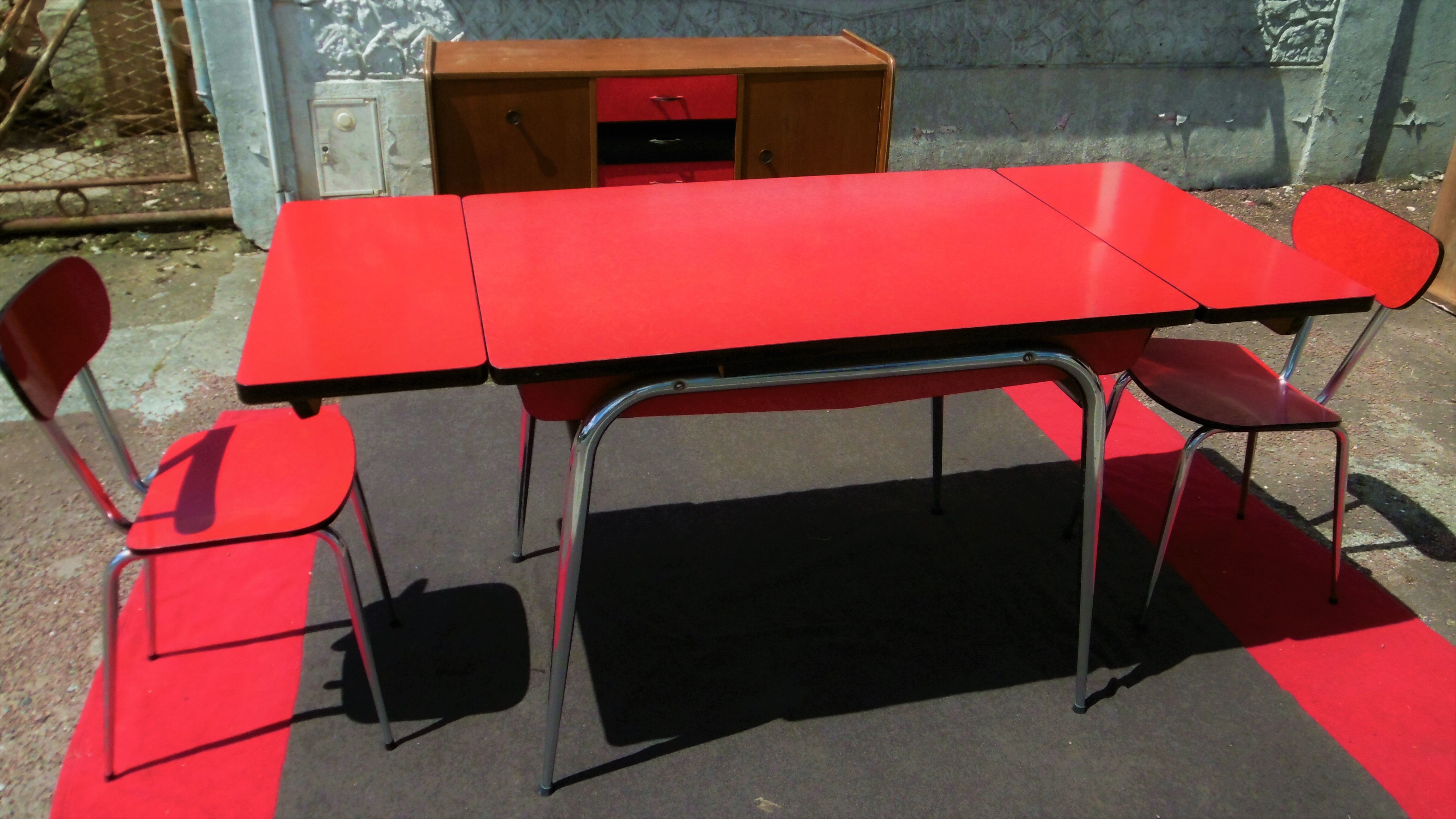 Red formica table and two chairs