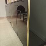 Black lacquered and brass design 70/80