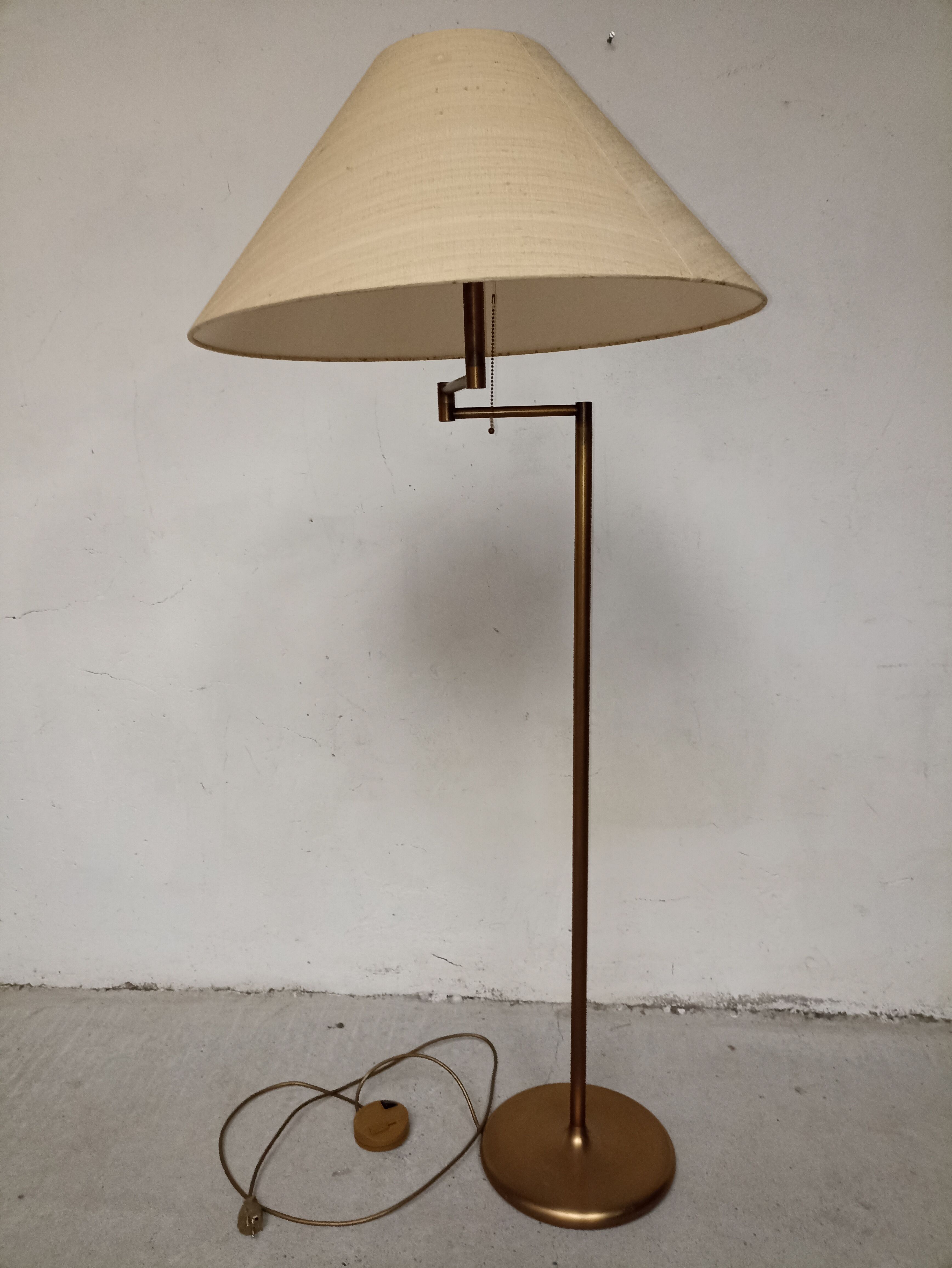 Brass articulated floor lamp