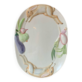 Very large serving dish with hares and vegetables.