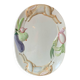 Very large serving dish with hares and vegetables.