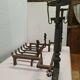 Pair of cast iron andirons for the fireplace