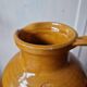 Antique glazed terracotta pitcher, brown semi-glazed jug, vase