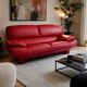 Three-seater red full-grain leather sofa – Vintage Italian design from the years.