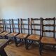 6 wooden and straw chairs