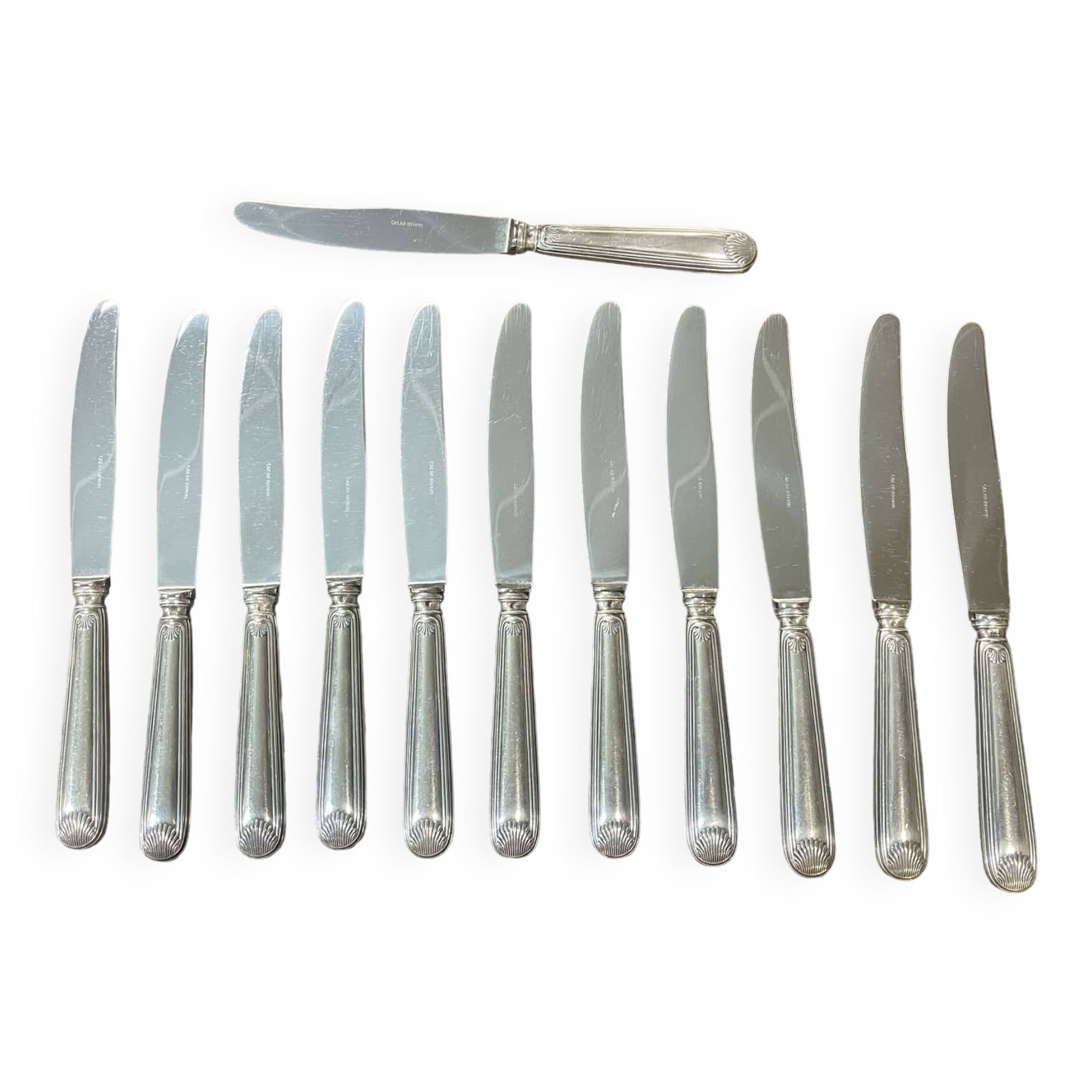 Set of 12 silver-plated metal knives, shell model, from CAILAR BAYARD