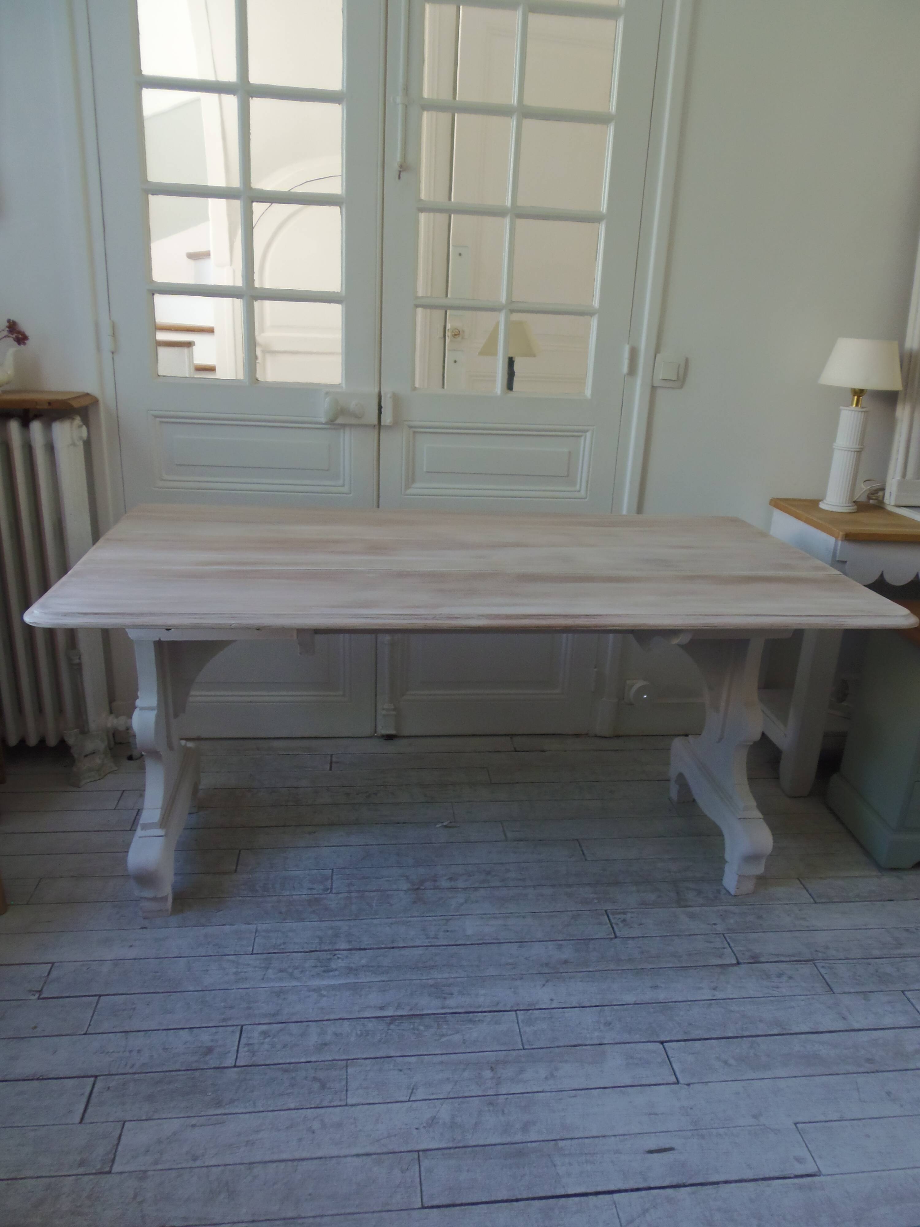 Console, solid walnut table, foldable extensions, grey patinated legs.