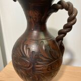Scarified ceramic vase with twisted handle - African style