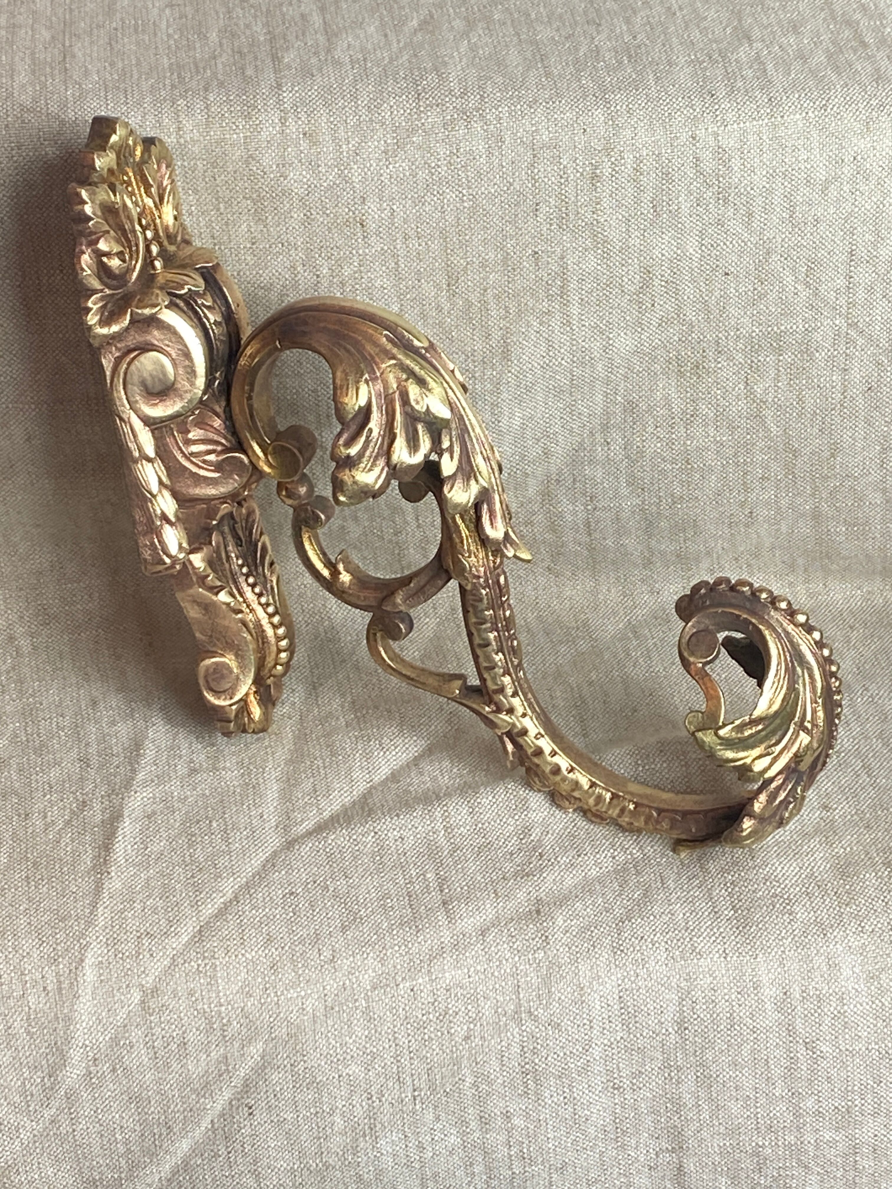 Golden bronze coat hook, 19th century