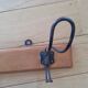 Coat rack three double hooks school style