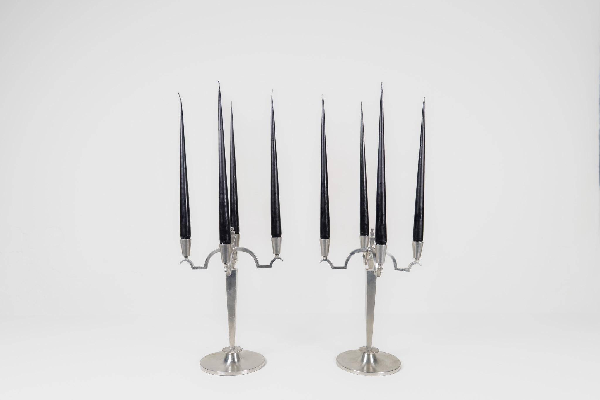 Sculptural Art Deco set of chandeliers in tin, Sweden, 1940s.