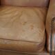 Fauteuil à oreilles en cuir de vache