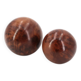 Sculptures of spheres carved in elm burl wood