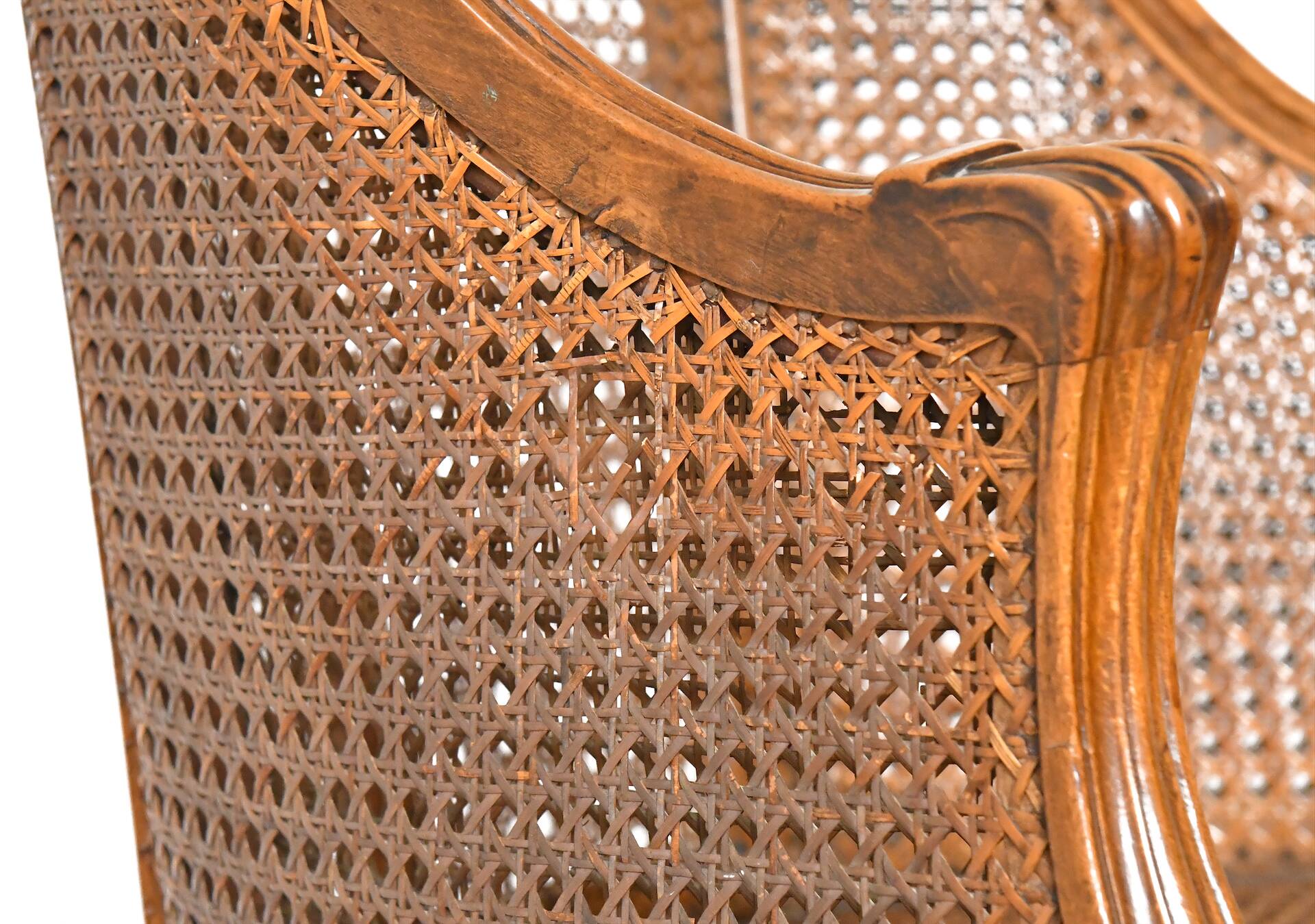 Louis XV style caned bergère armchair