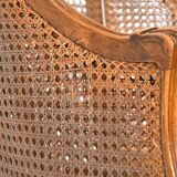 Louis XV style caned bergère armchair