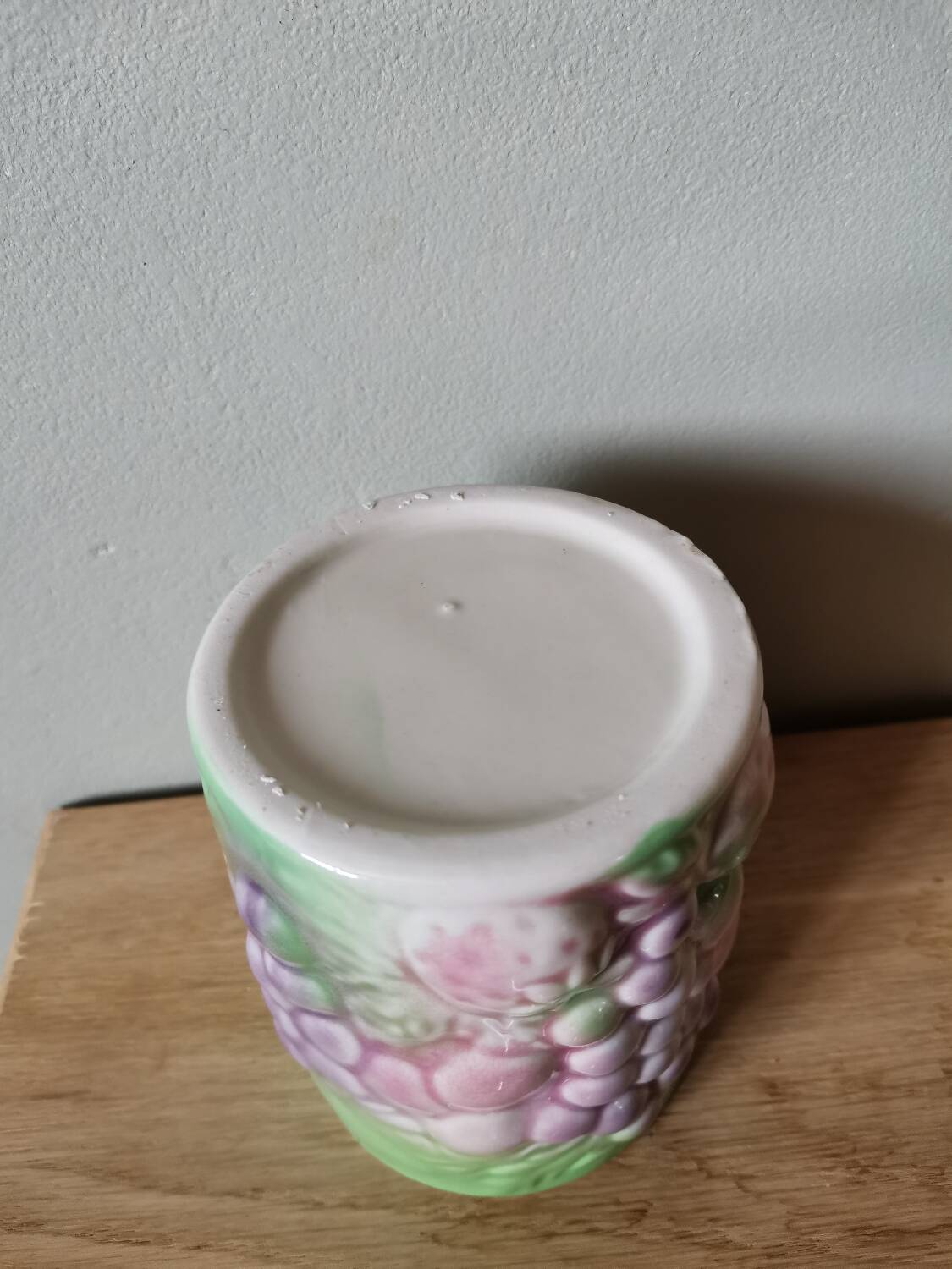 Vintage ceramic cup with vintage fruit pattern, pastel tone