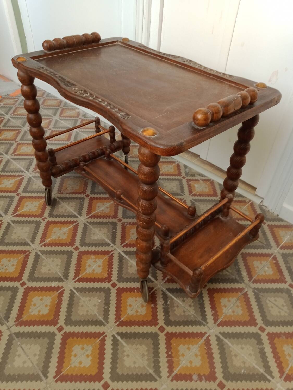 Wooden trolley on wheels