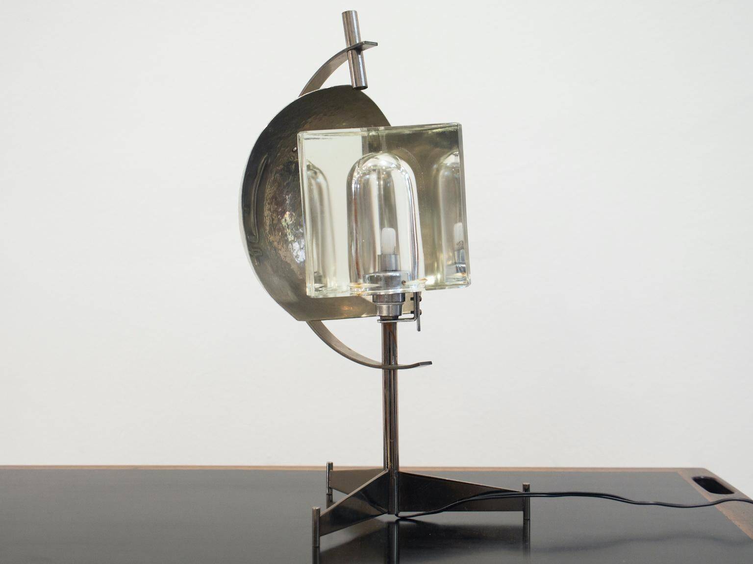 Metal table lamp with triangular glass light on tripod stand, 1970s.