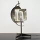 Metal table lamp with triangular glass light on tripod stand, 1970s.